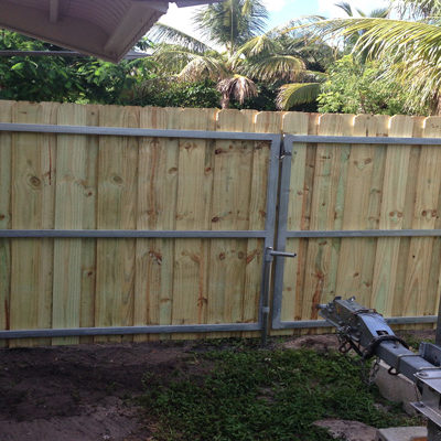 wood fence double drive gate