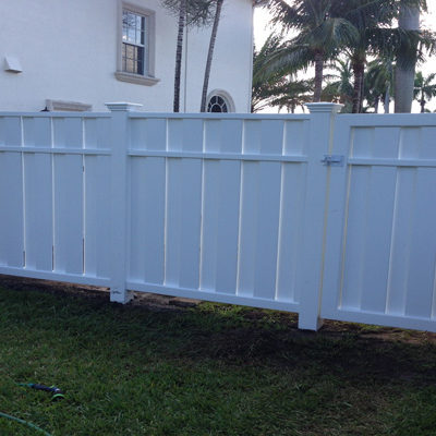 PVC fence with walk gate installation