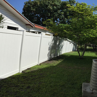 pvc fence on side of house