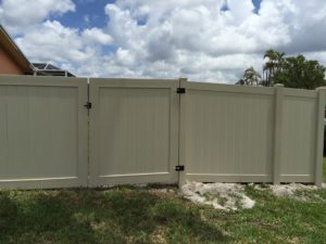 tan pvc fence installation