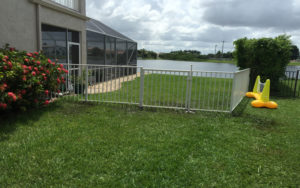 white aluminum fence